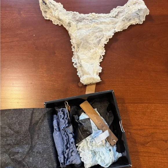 SKIMS Lace Thong Set in Cream, Light Blue, and Blue - Picture 2 of 3